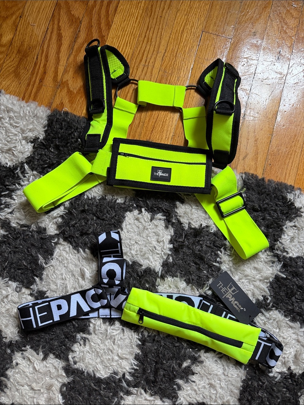 2 Pack Neon yellow chest harness bag with adjustable straps and zipper pouches.
